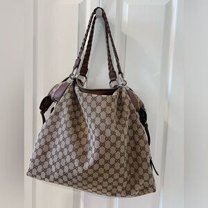 Gucci braided leather monogram large bag